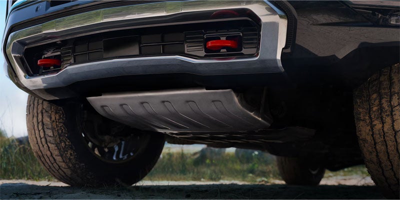 A red 2026 Chevrolet Tahoe parked on the roadside