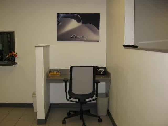 Office area with a desk and chair